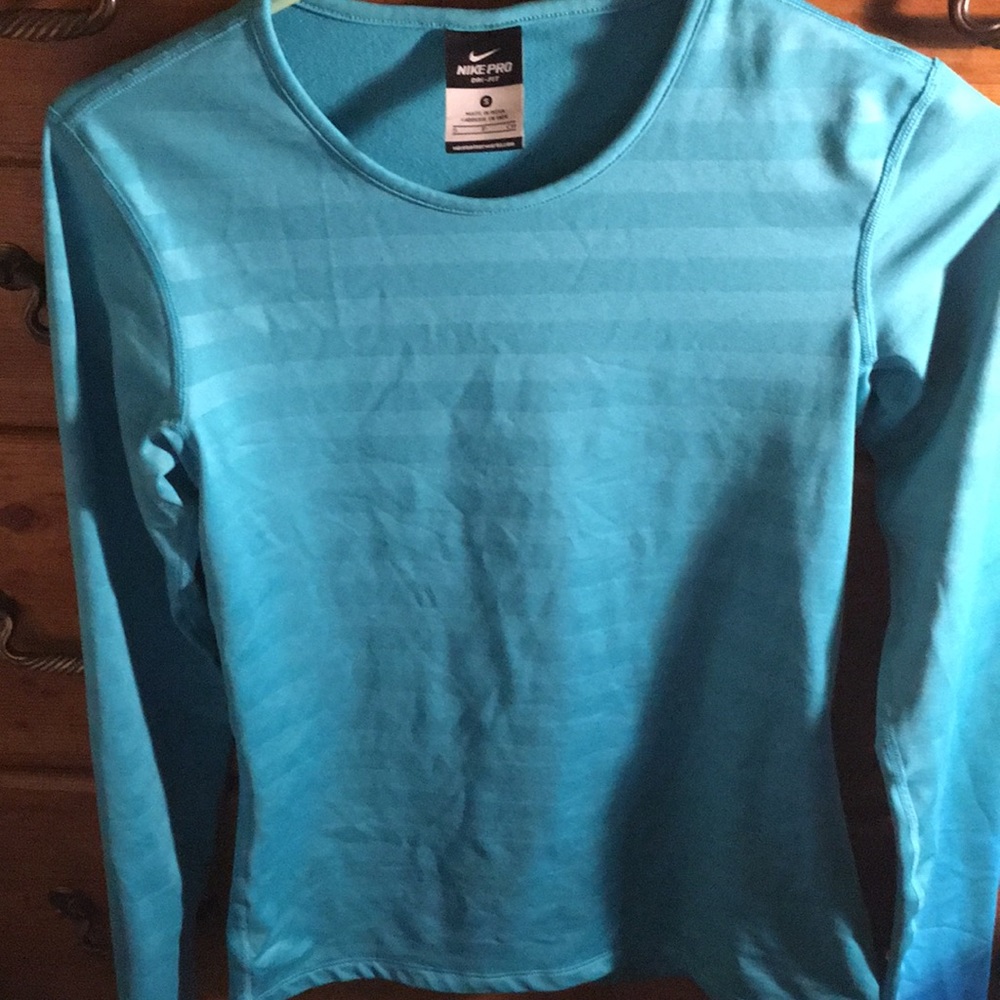 Women’s Nike Pro Dri Fit Long Sleeve Shirt. Fleece lined.